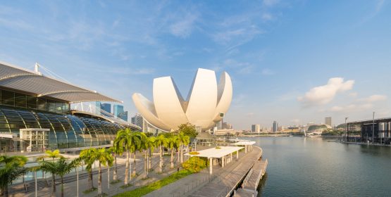 ArtScience Museum and Marina Bay with blue sky at noon in Singapore City